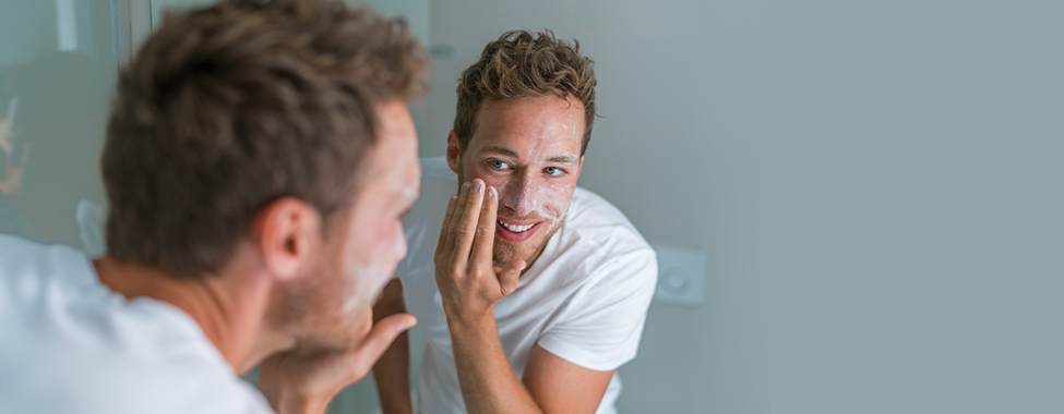 Man cleaning face