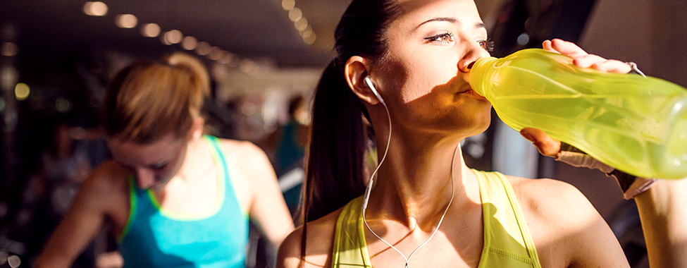 Woman Staying Hydrated After Detoxing While Sweating