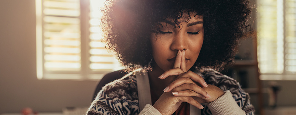 Woman Meditating for Mental Health in Winter