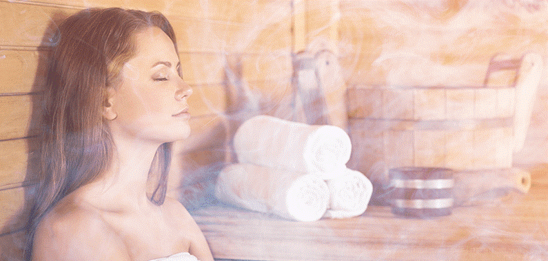Woman-Sweating-in-Sauna-to-Detoxify