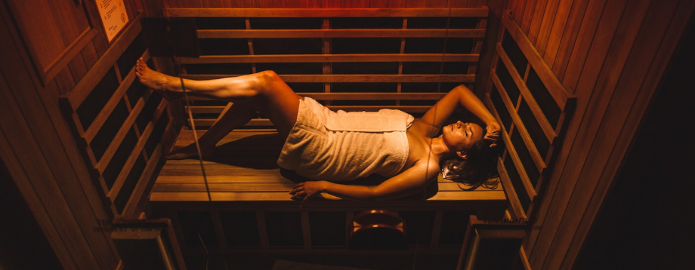 Woman Using Clearlight® Infrared Sauna for Better Sleep