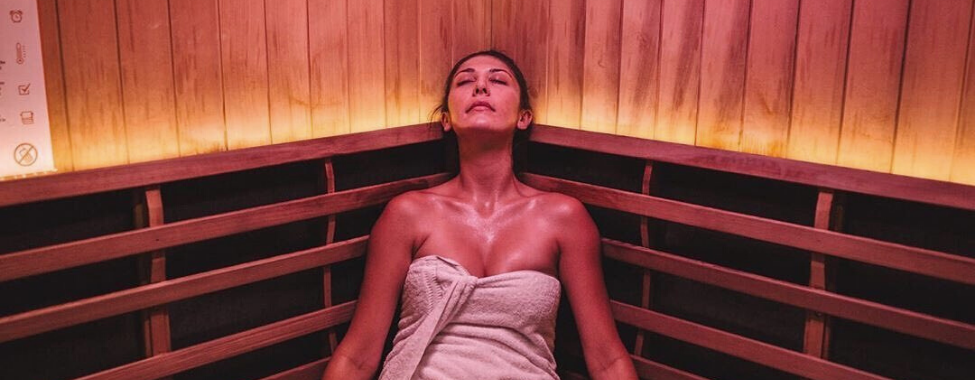 Woman Enjoying Infrared Sauna in Home Sanctuary