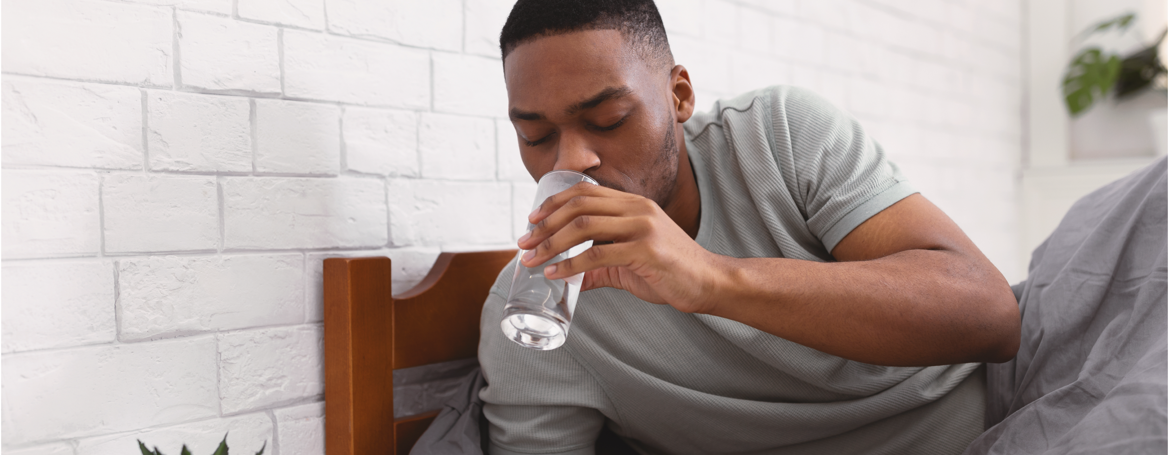 Man Drinking Water in the Morning to Stay Hydrated