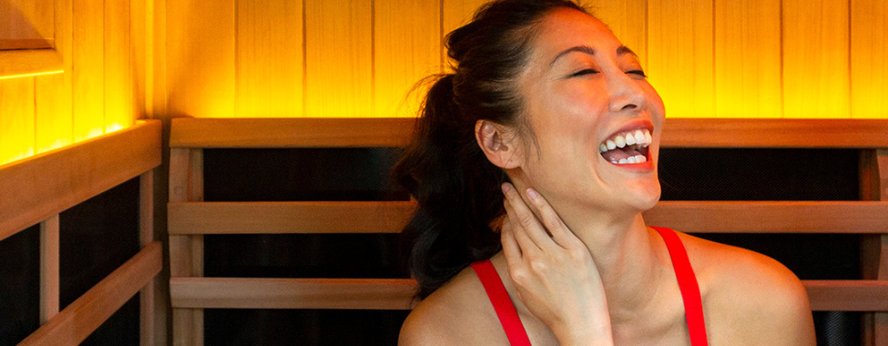 Woman Enjoying Summer Skin Benefits of Infrared Sauna
