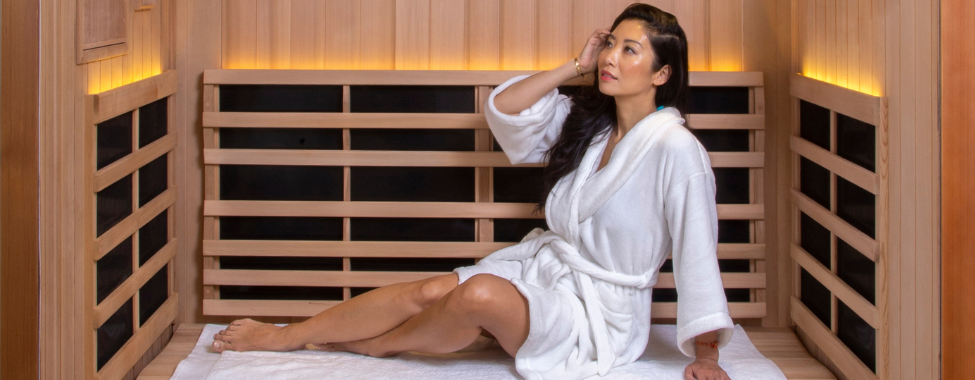 Woman Using Infrared Sauna During DIY Spa Day