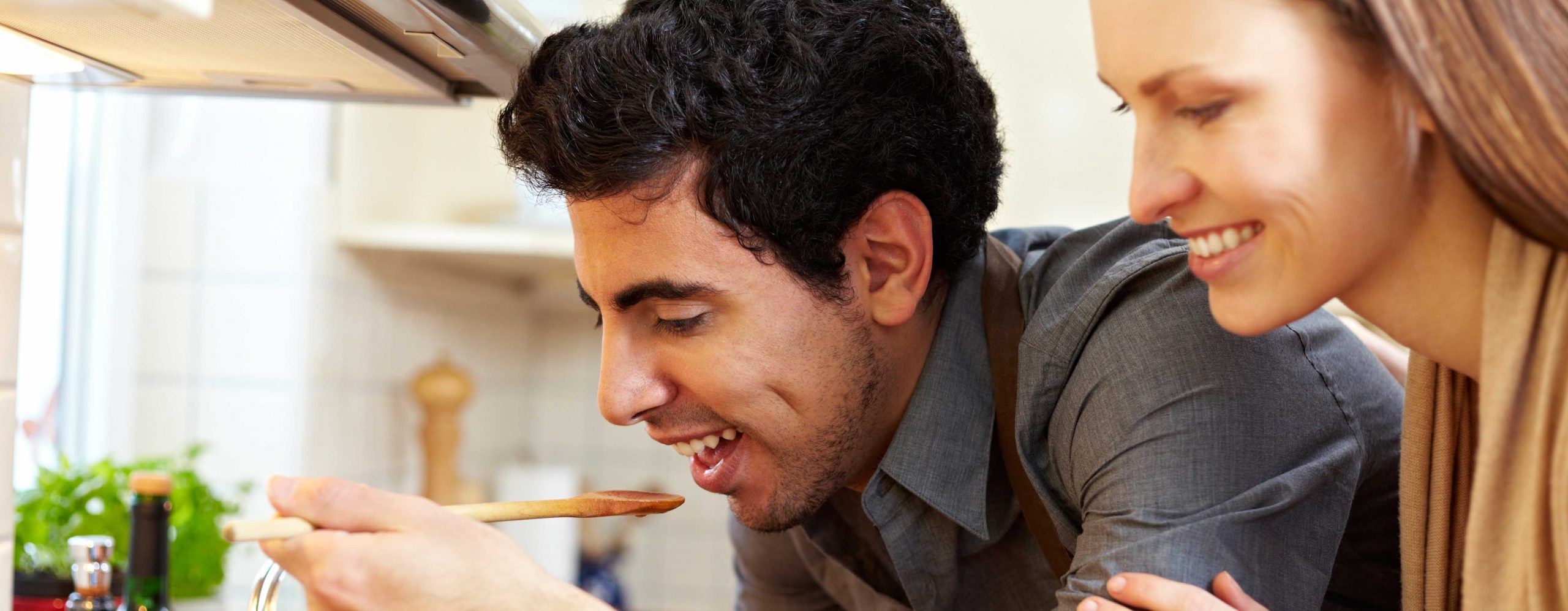 Couple Cooking Warm Meal to Stay Warm Naturally