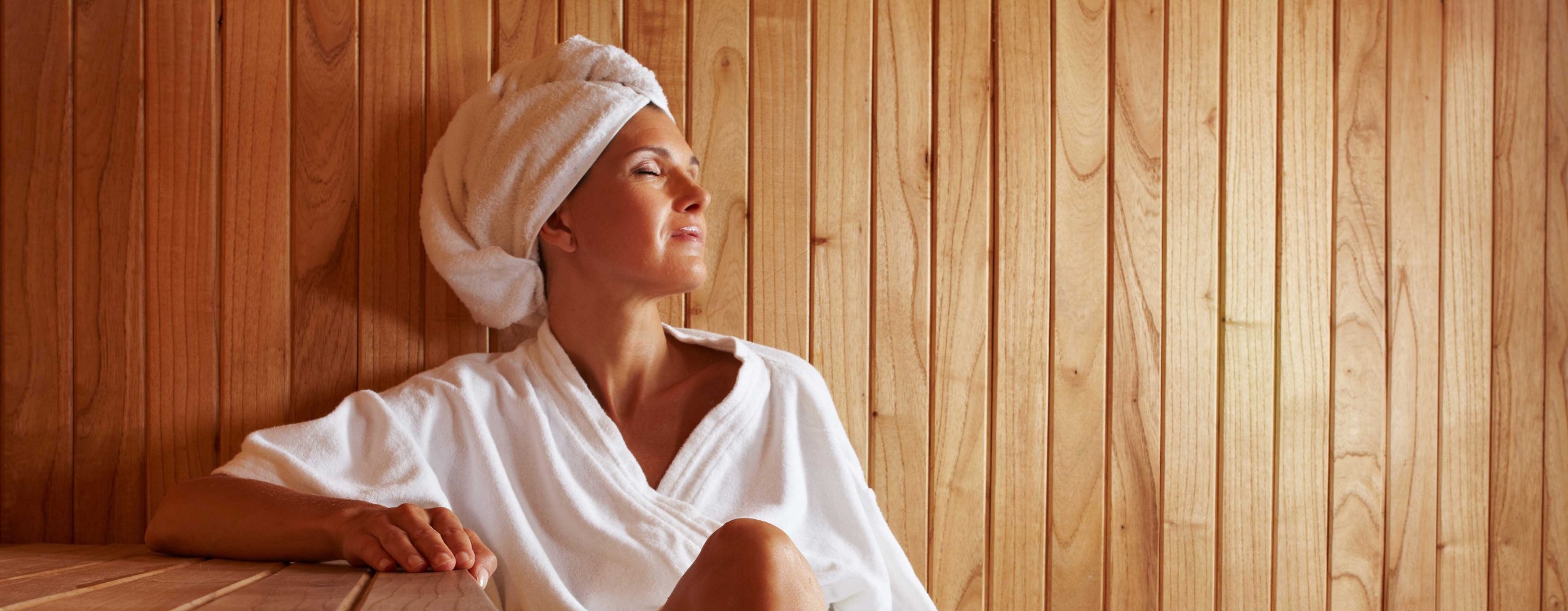 Woman Using Infrared Sauna for Respiratory Benefits
