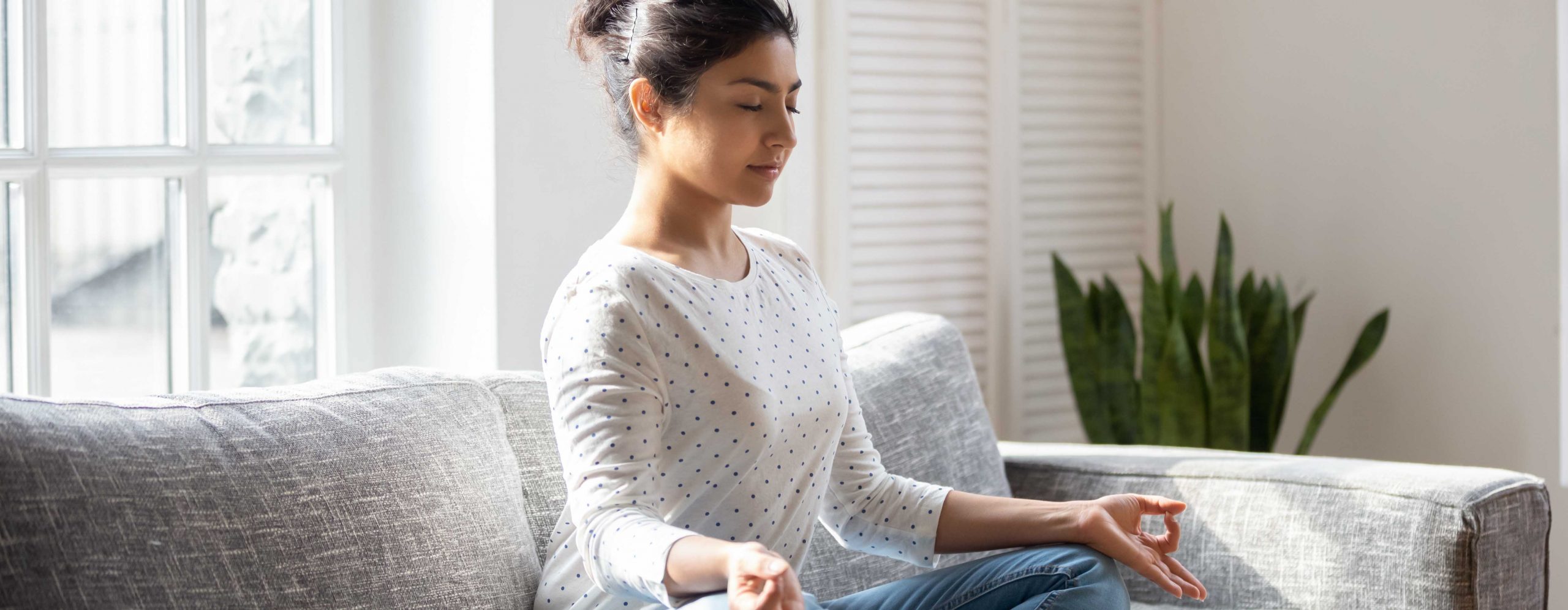 Woman with Good Posture Doing Breathing Exercises