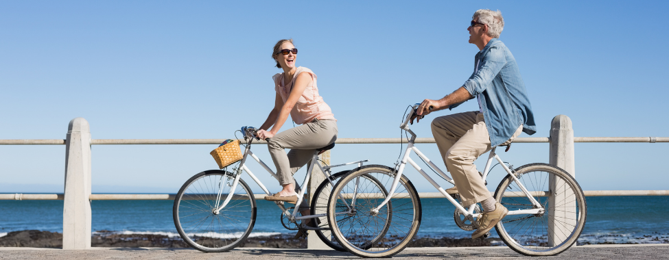 Healthy Couple Riding Bikes in Spring