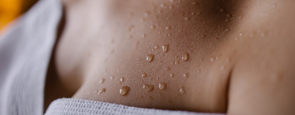 Woman Sweating in Infrared Sauna While Sick