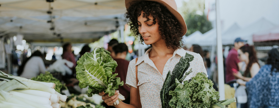 Woman Buying Produce at Farmers Market for Spring Detox