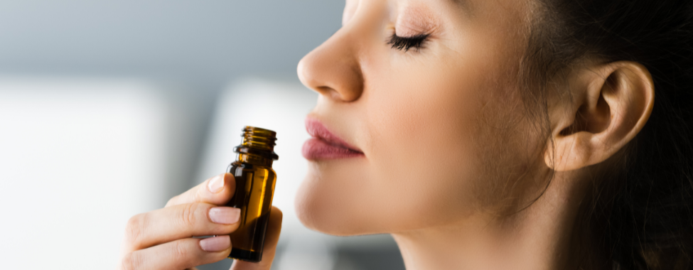Woman Using Aromatherapy to Treat Asthma Naturally