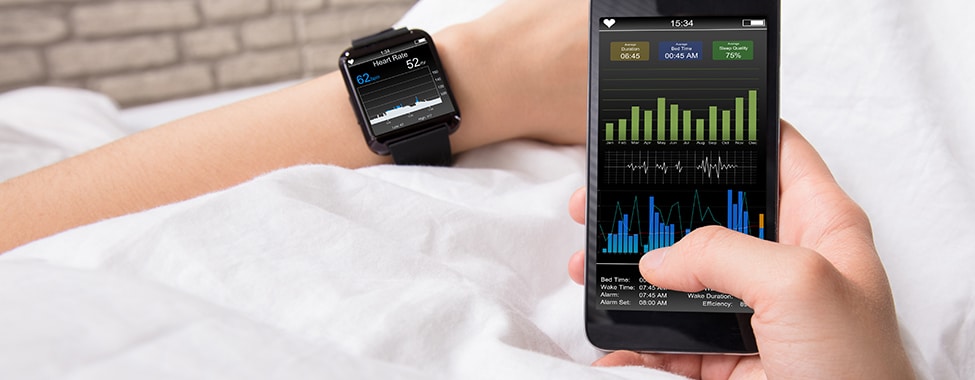 Person Using Wearable Fitness and Wellness Tracker