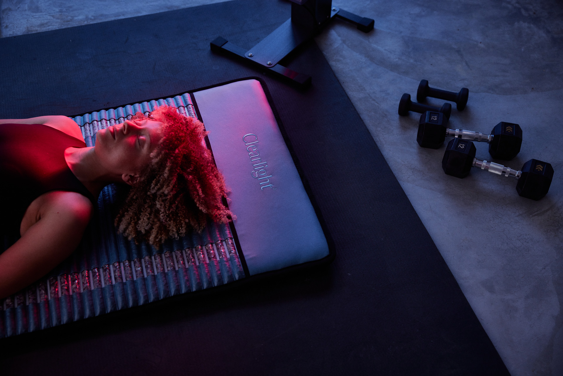 Woman laying on mat