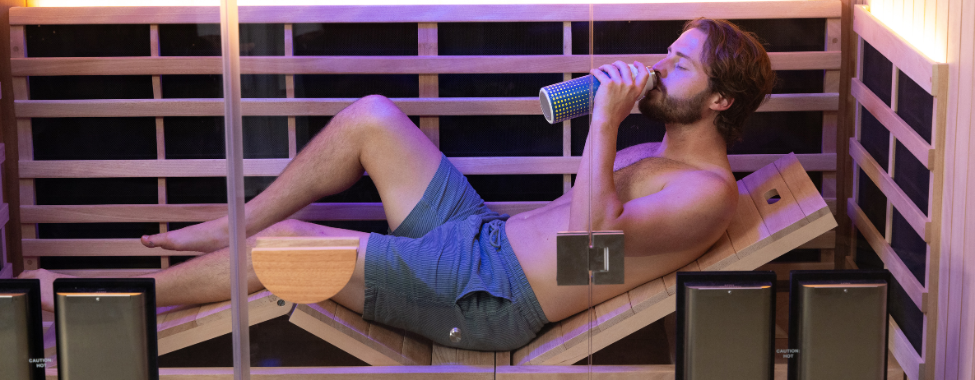 Man Lounging in Clearlight Infrared Sauna with Chromotherapy