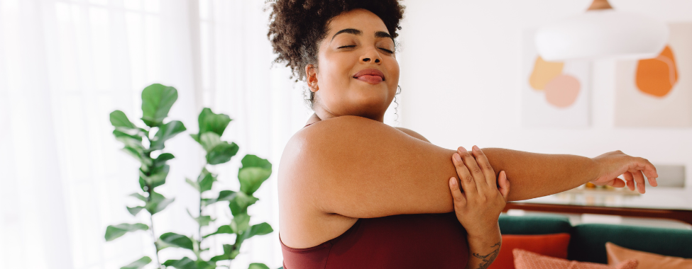 Woman Stretching Shoulders to Help Improve Mobility