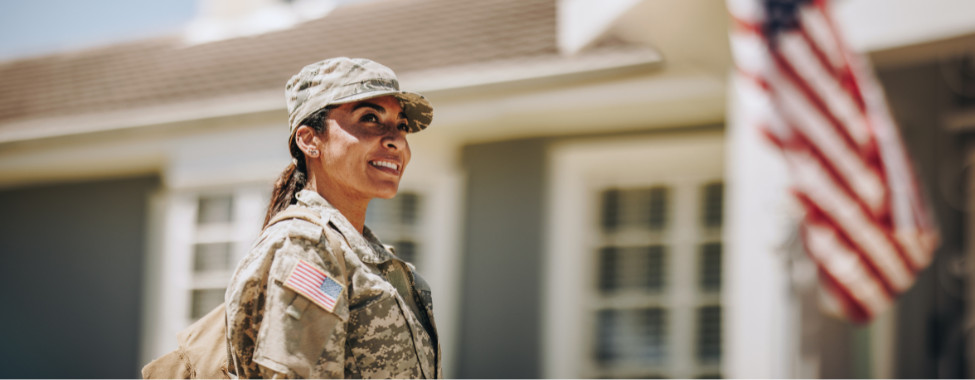 Happy Veteran at Home with American Flag