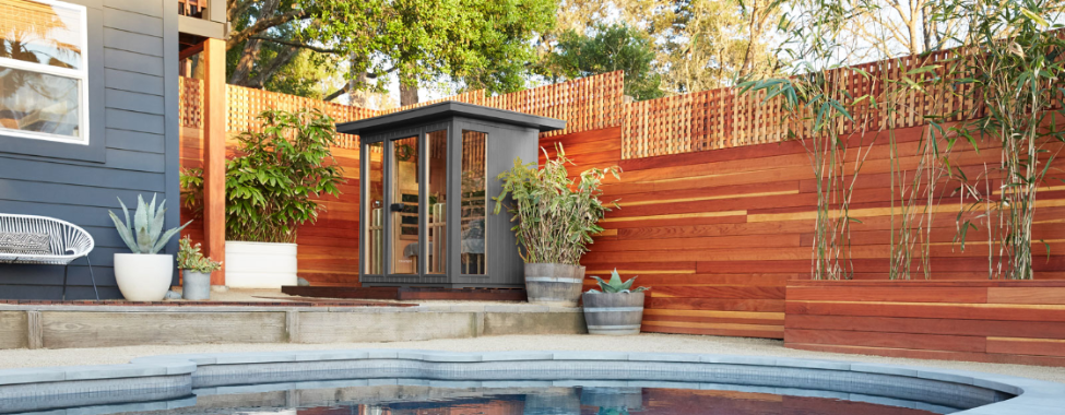 Outdoor Clearlight Infrared Sauna in Backyard by Pool