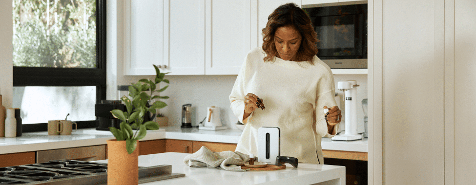 Woman Using AROMA ONE® Aromatherapy Diffuser