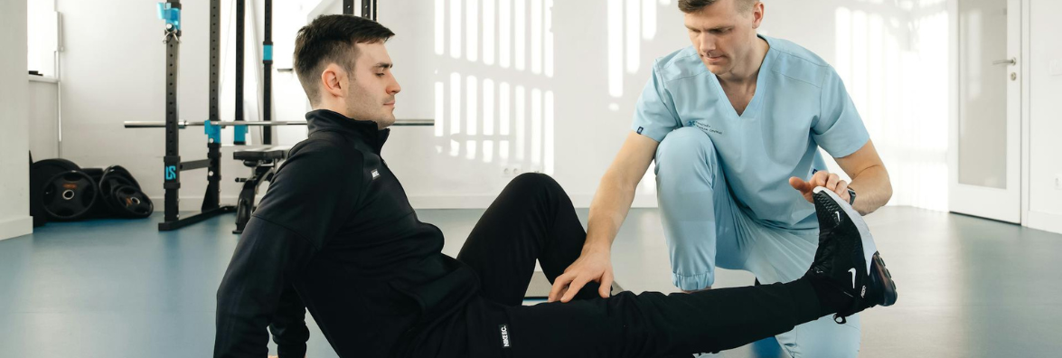 Physical Therapist Treating Patients in Physiotherapy Session