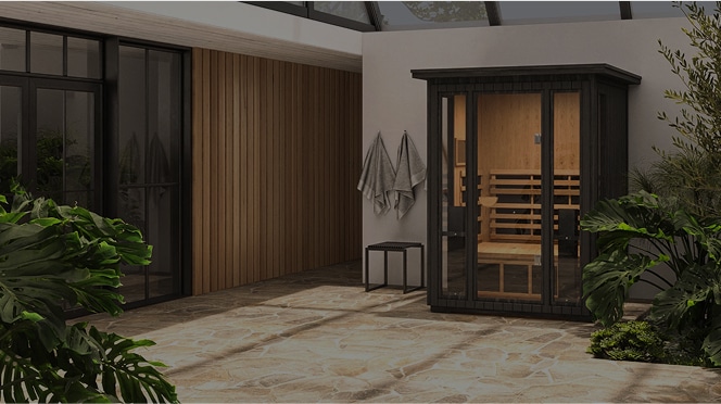 A Clearlight Sanctuary outdoor sauna in a courtyard of a home.