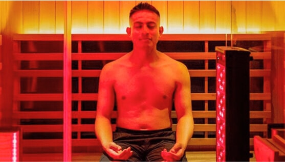 Infrared Therapy man sitting in infrared sauna