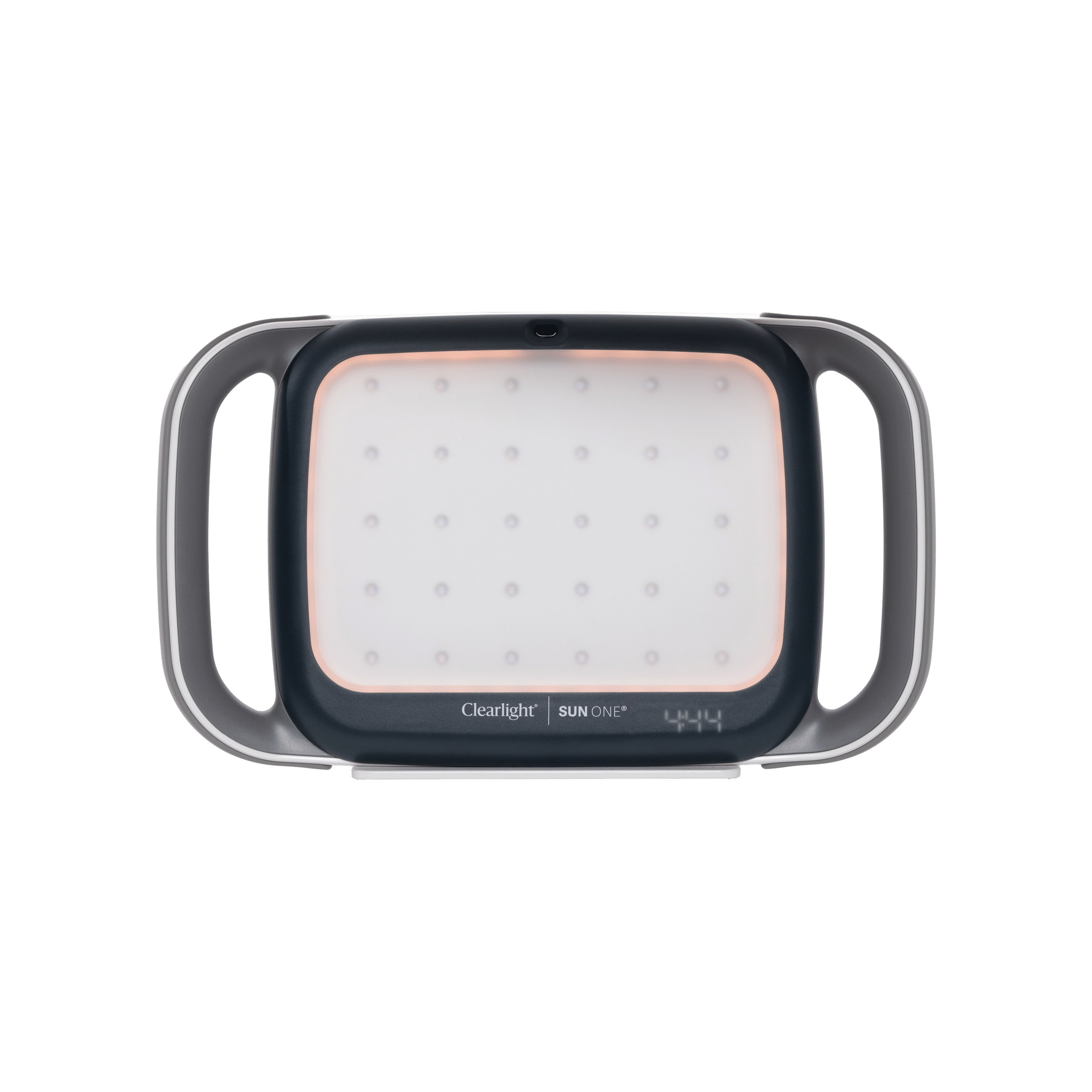 Close-up of the front panel of a ClearLight Sun One light therapy device, showing the LED panel and branding at the bottom edge in a dark casing.